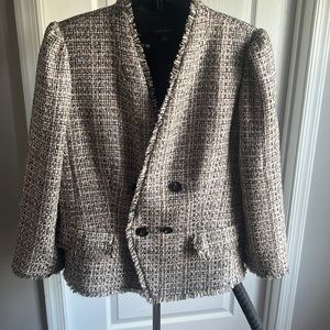 ANN Taylor blazer size 14 can fit size 12 as well.